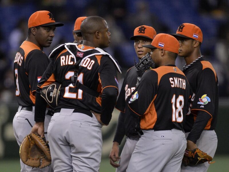Baseball Players in Huddle