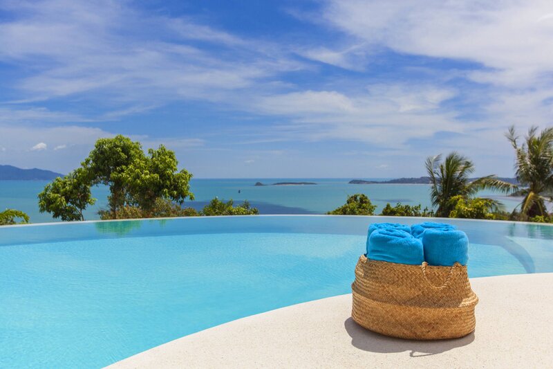 Basket of Towels by Pool