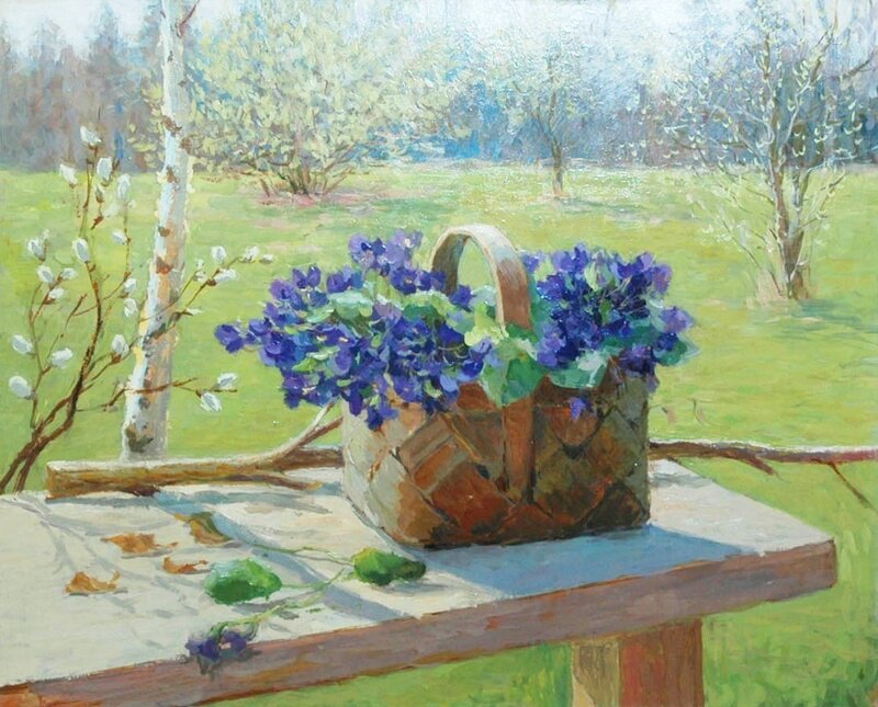 Basket of violets on a table