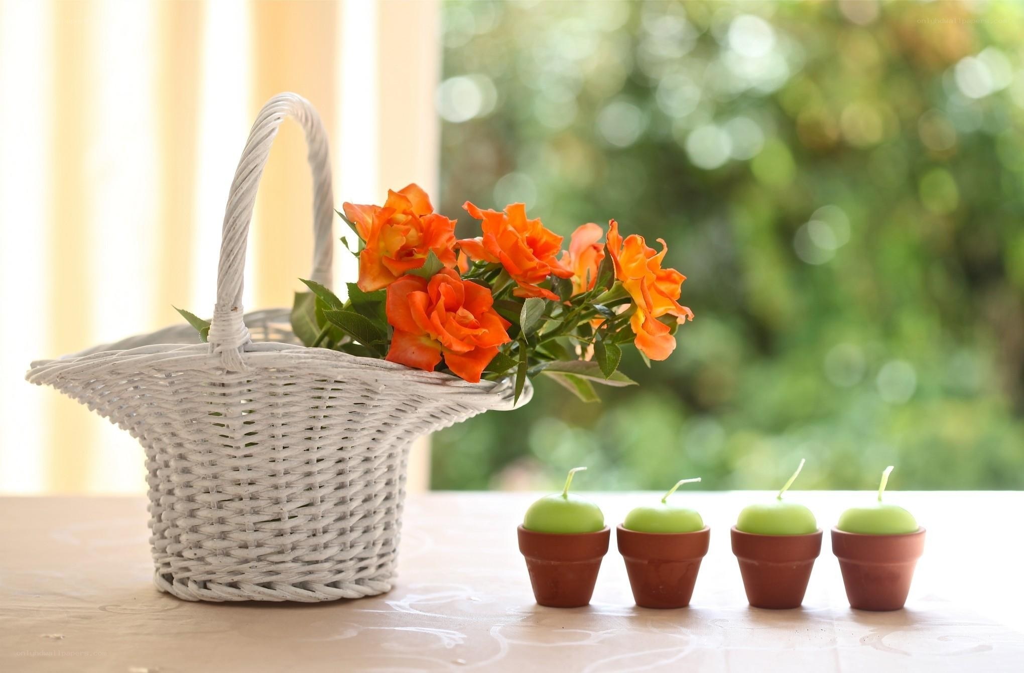 Basket with flowers and candles