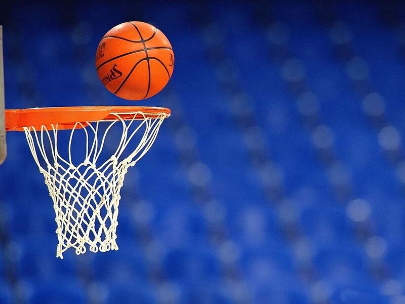 Basketball Going Through Hoop — Orange