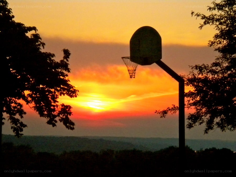 Basketball hoop at sunset