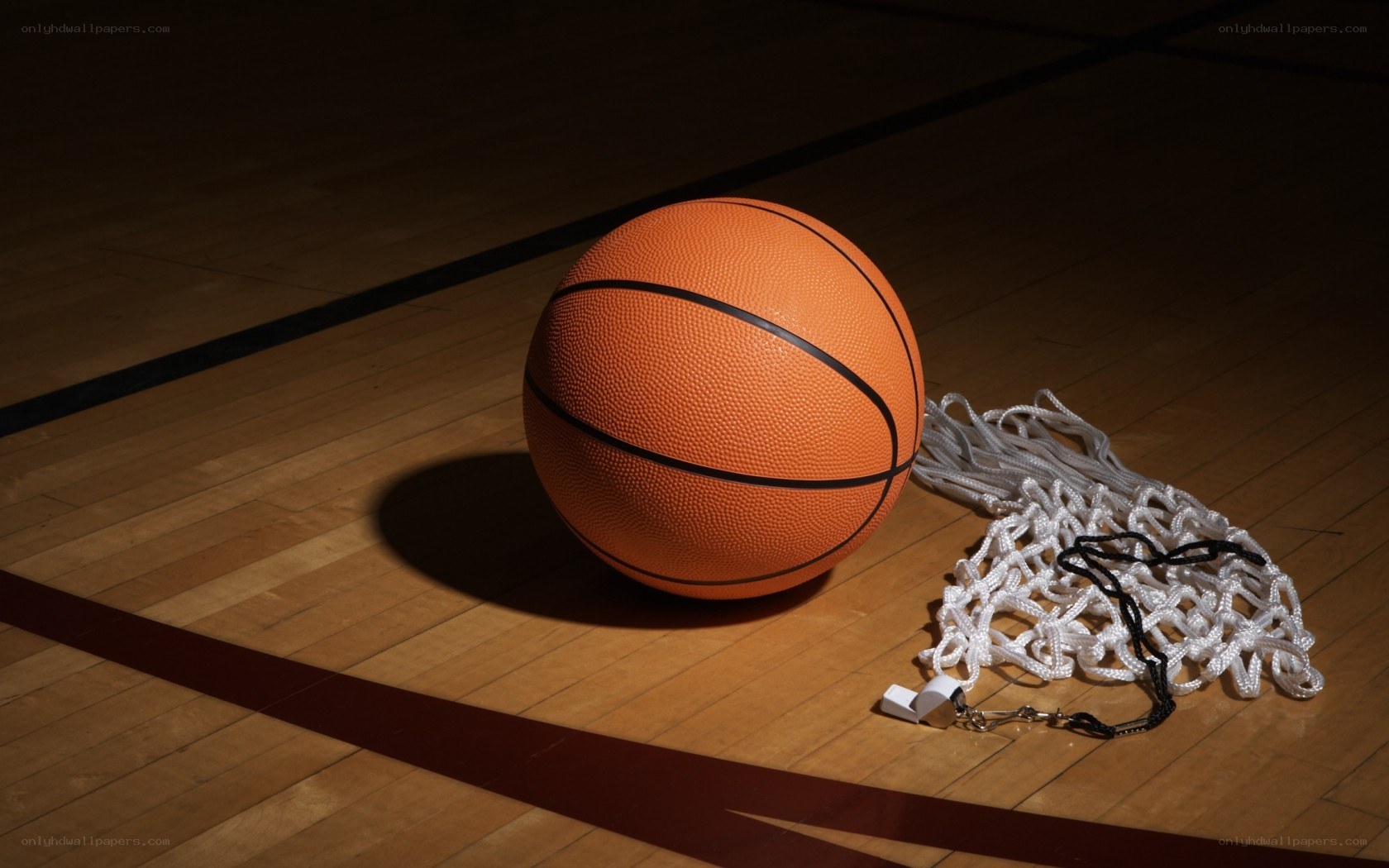 Basketball on court with net