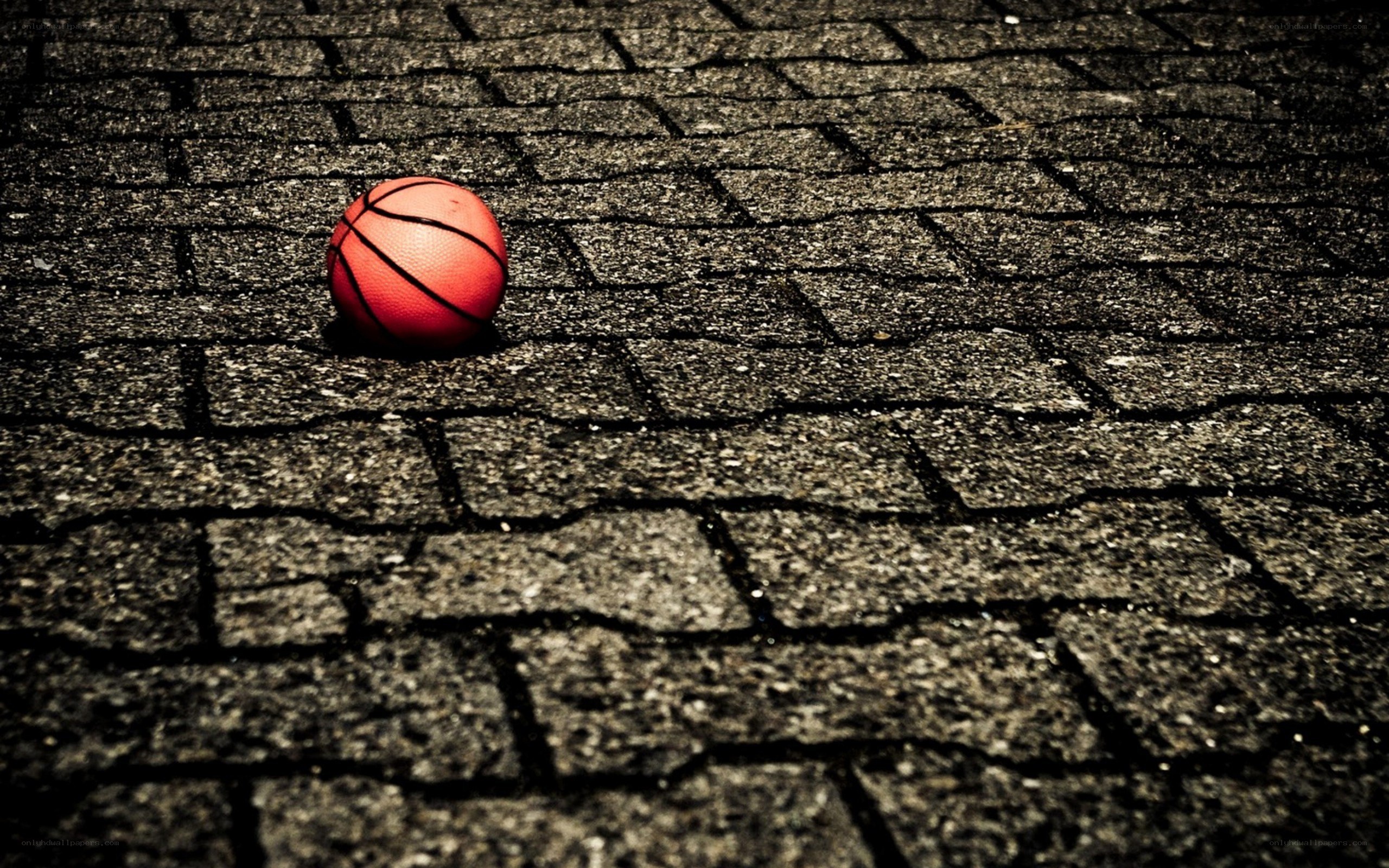 basketball on pavement