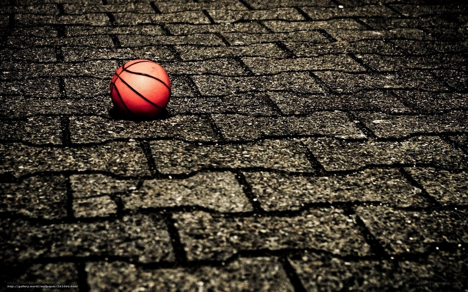 basketball on pavement