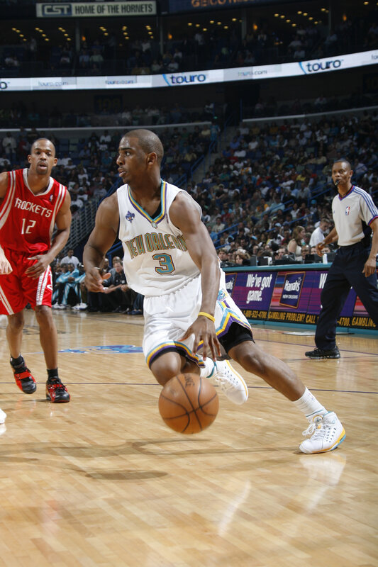 basketball player dribbling on court