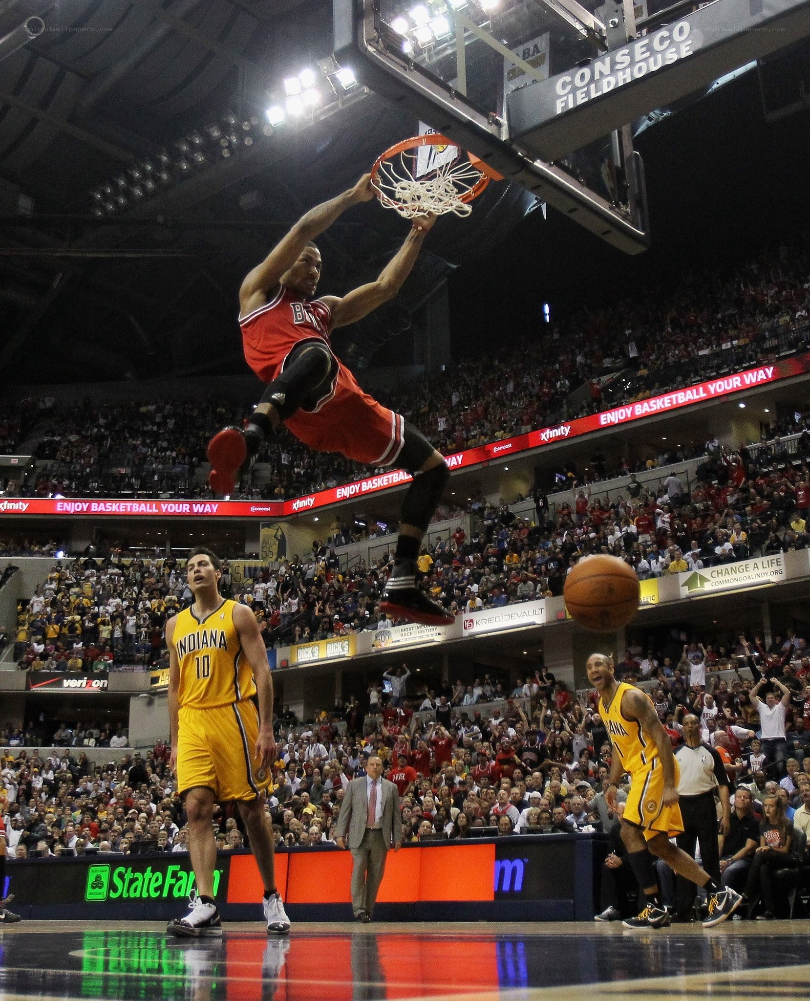 basketball player dunks the ball