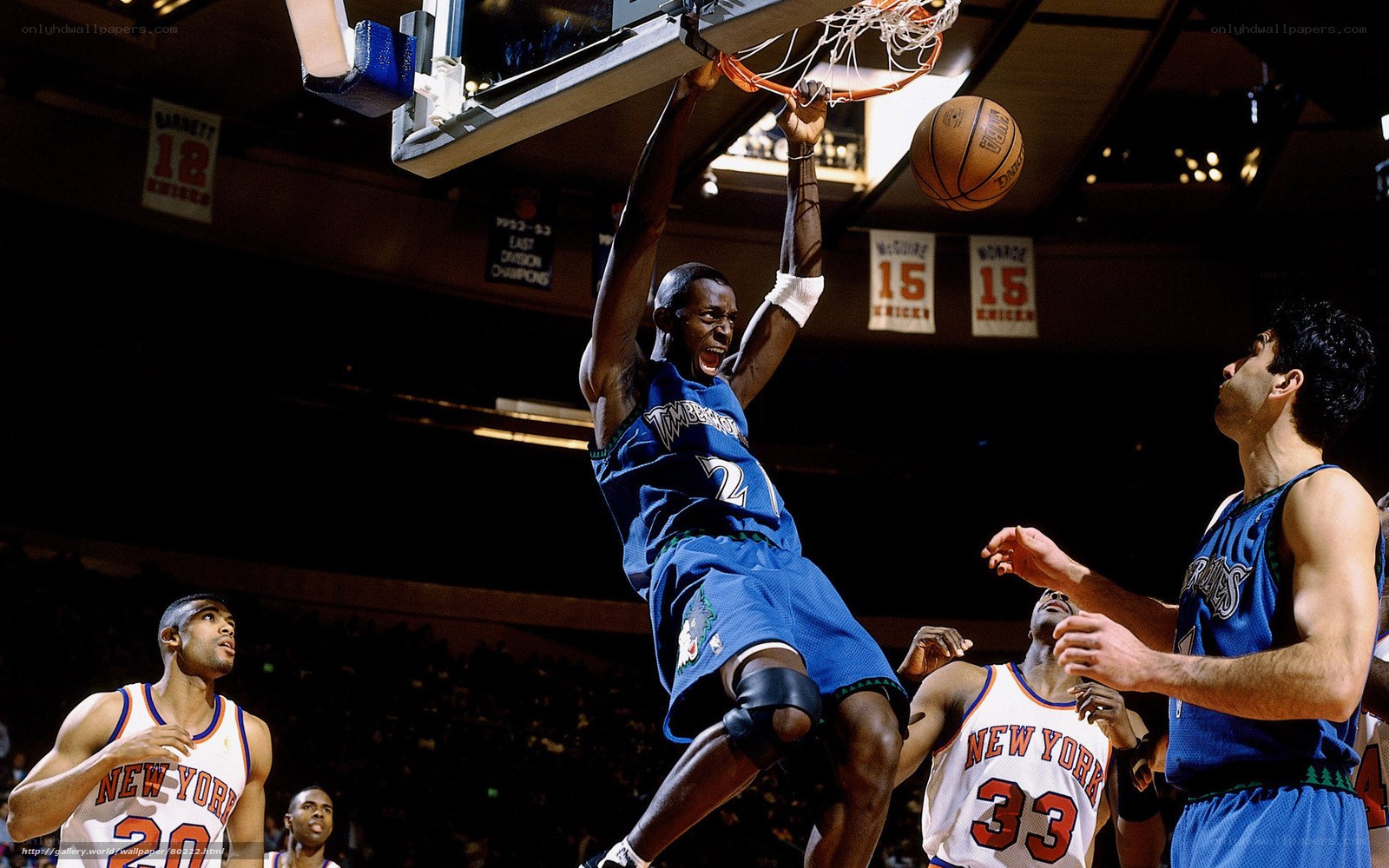 basketball player dunks the ball