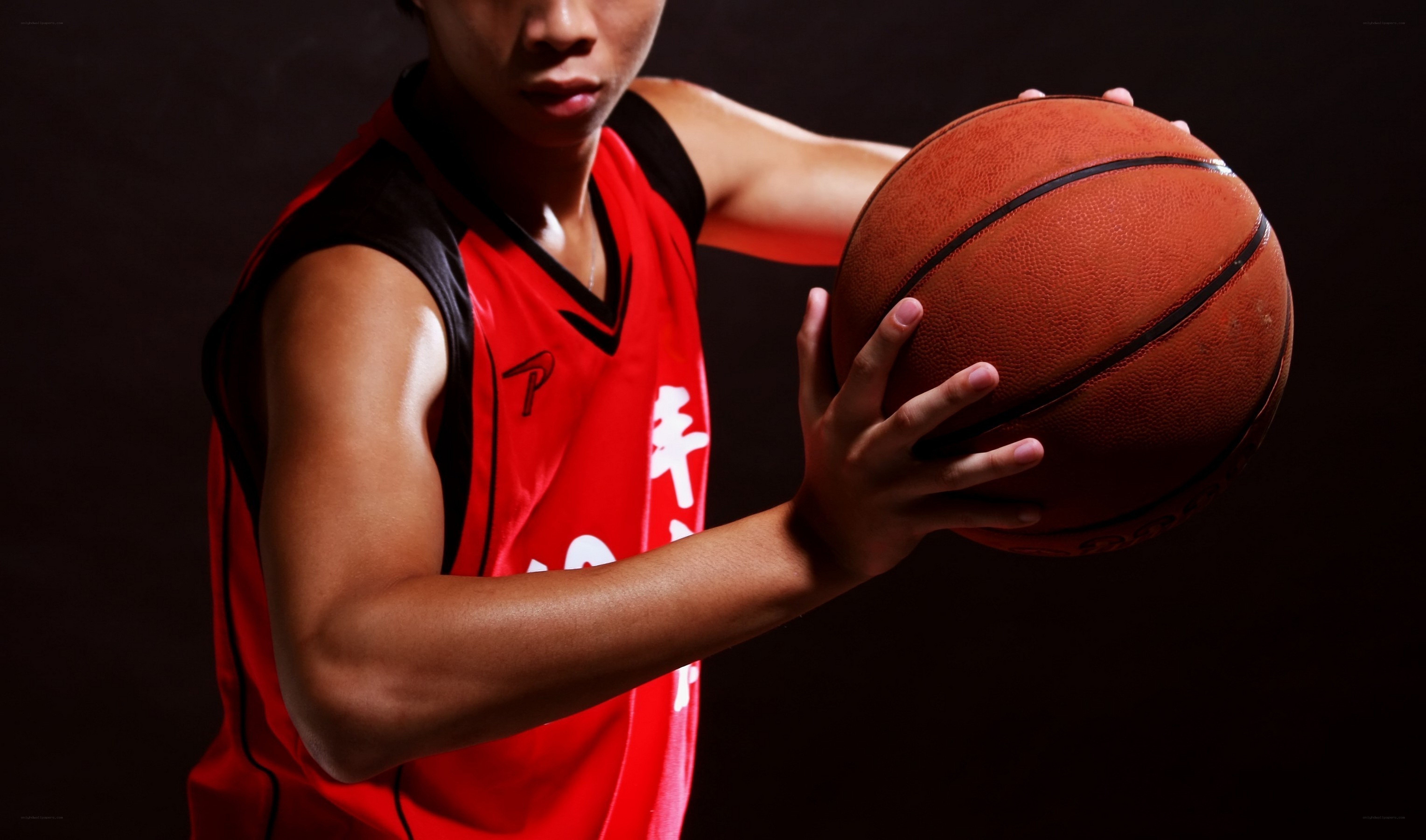 basketball player holding ball