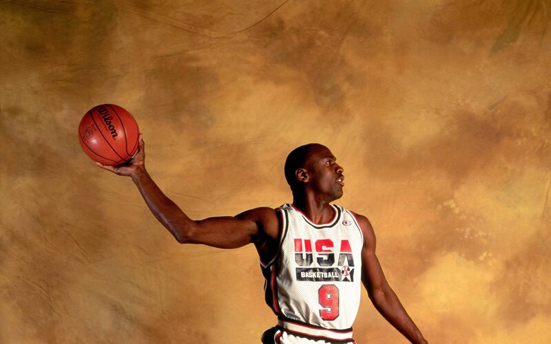Basketball Player Holding Ball — Brown