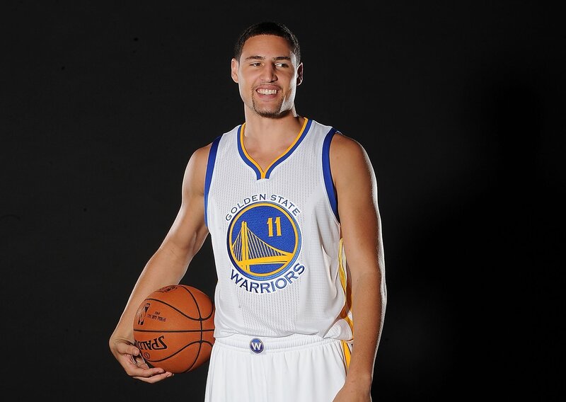 Basketball Player Holding Ball — White