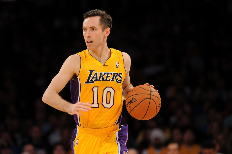 Basketball Player Holding Ball — Yellow, Focused, Night