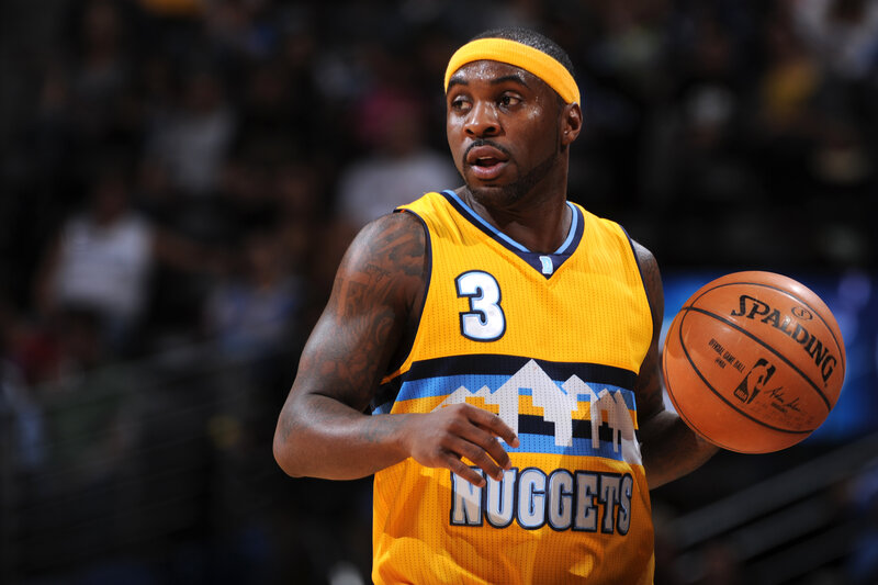 Basketball Player Holding Ball — Yellow, Focused