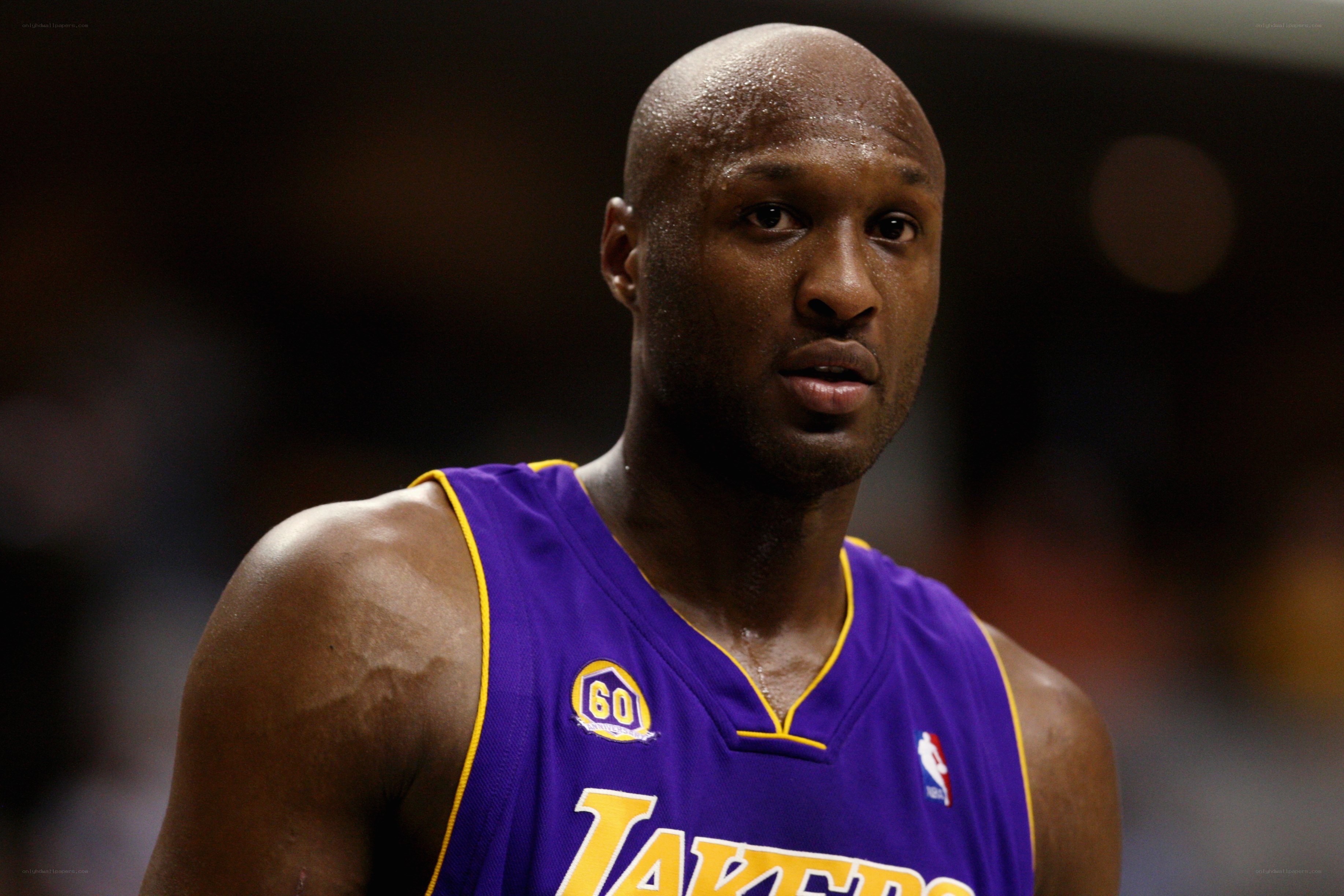 basketball player in purple jersey