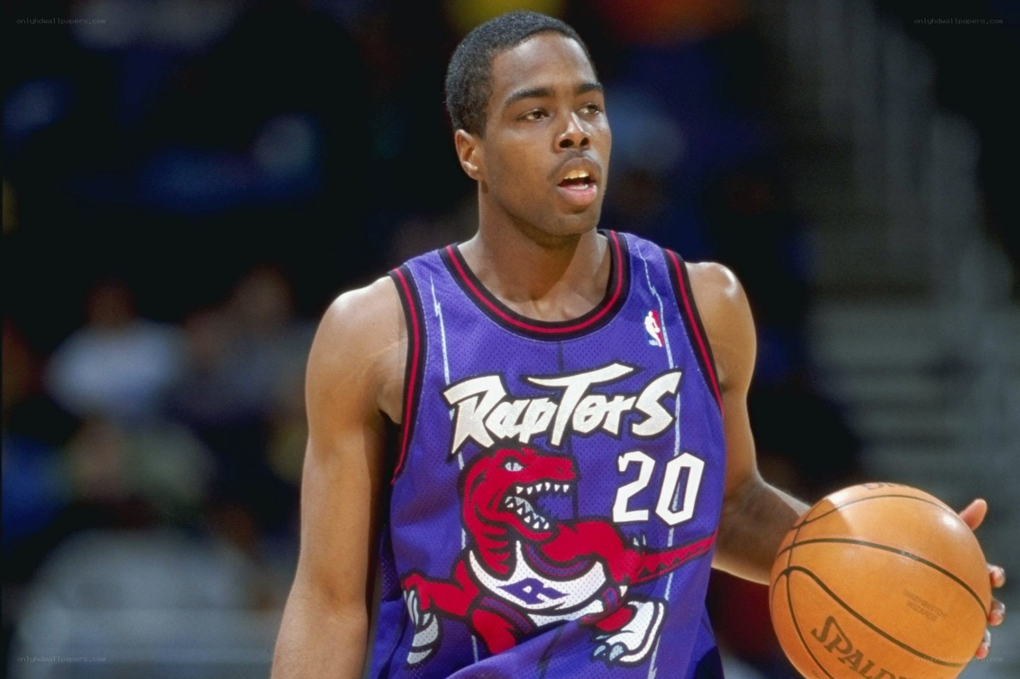 basketball player in raptors jersey