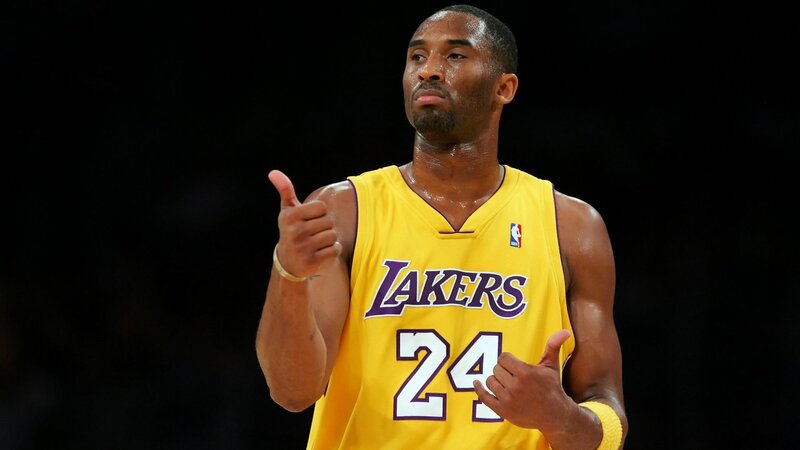 Basketball Player in Uniform — Yellow, Intense, Photograph
