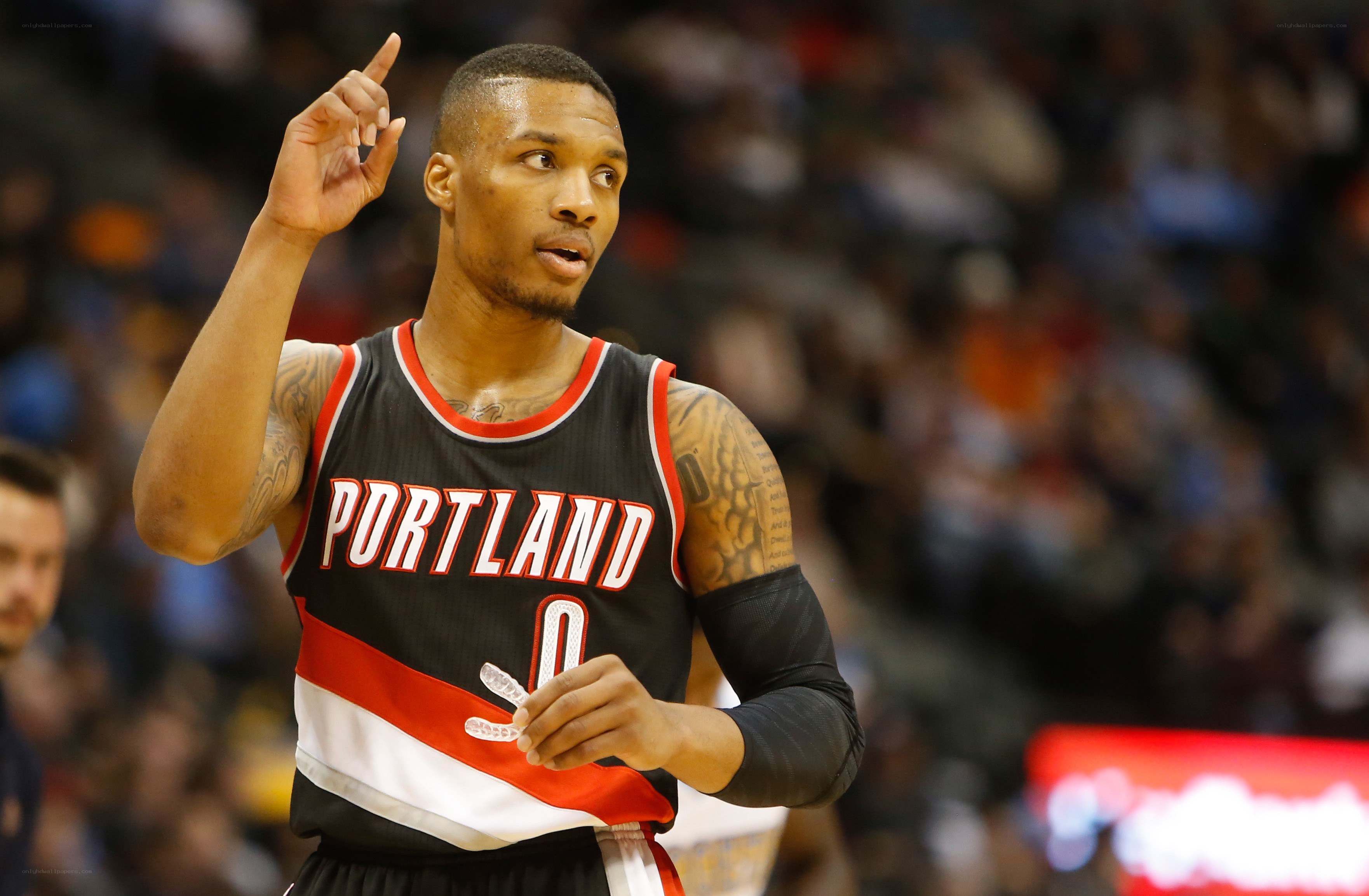 basketball player pointing up