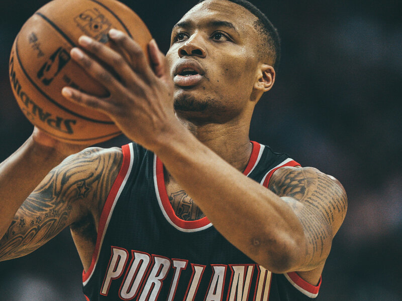 Basketball Player Shooting — Black, Focused