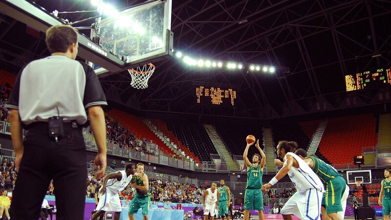 Basketball Player Shooting — Green, Intense, Night