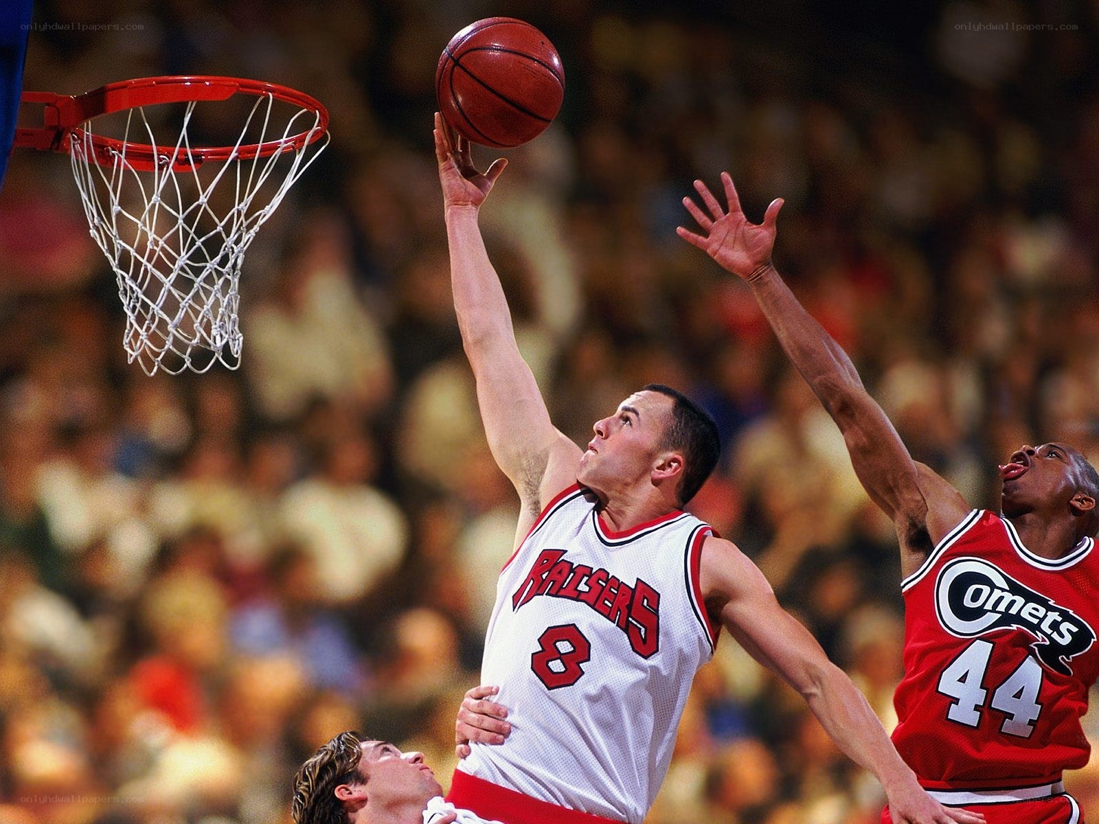 Basketball player shooting layup