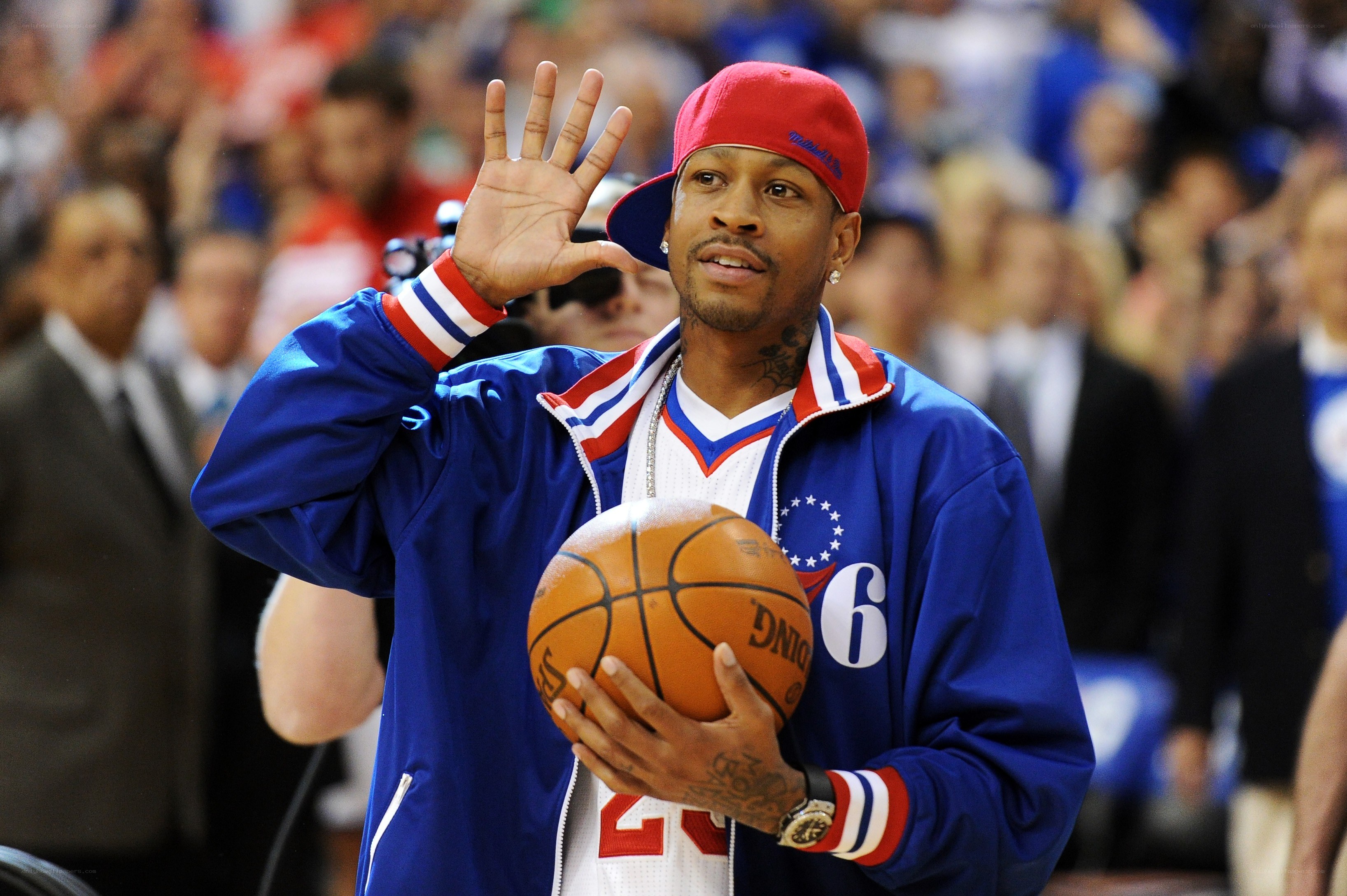 basketball player waving to crowd