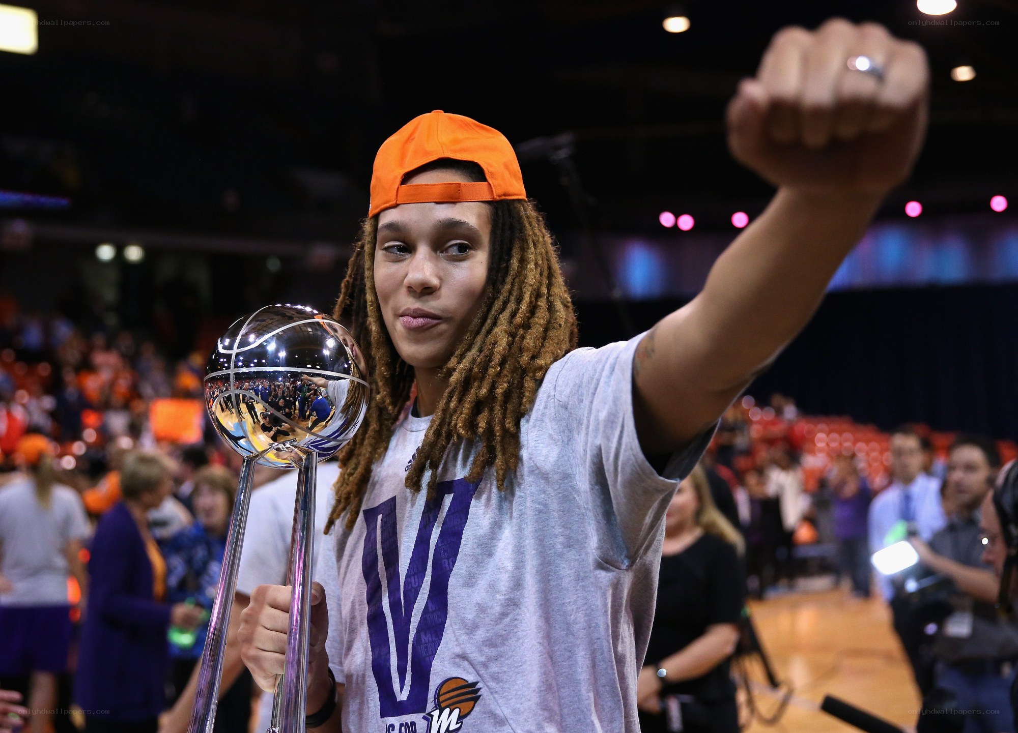 basketball player with trophy