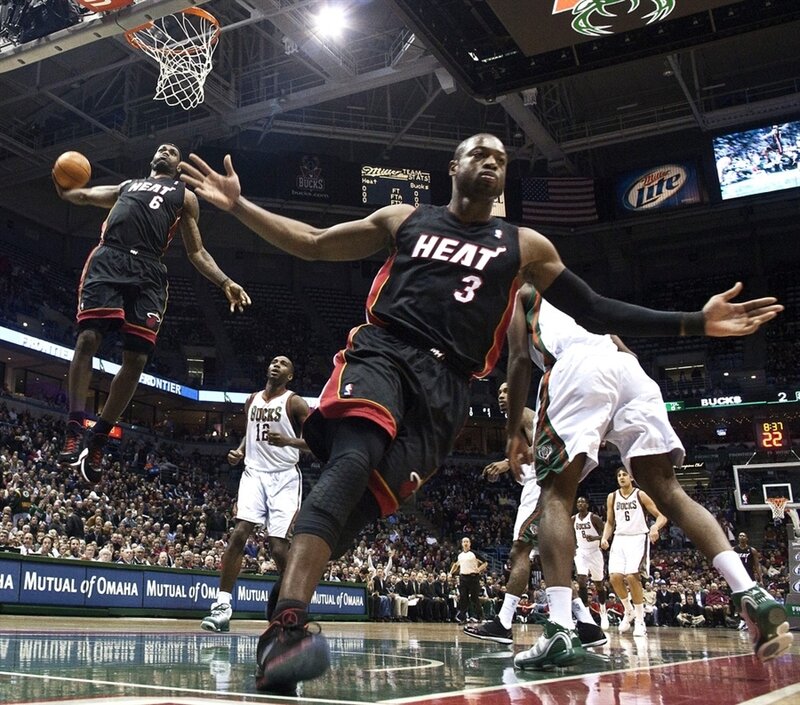Basketball Players in Action — Black