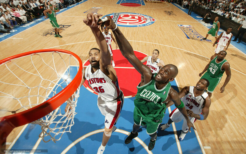 Basketball Players in Action — Green, Intense, Competitive