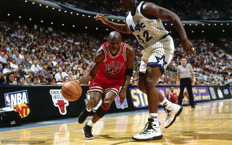 Basketball Players in Action — Red, Intense, Photograph