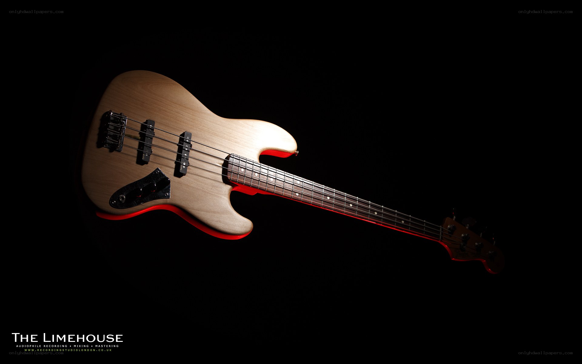 bass guitar on black background