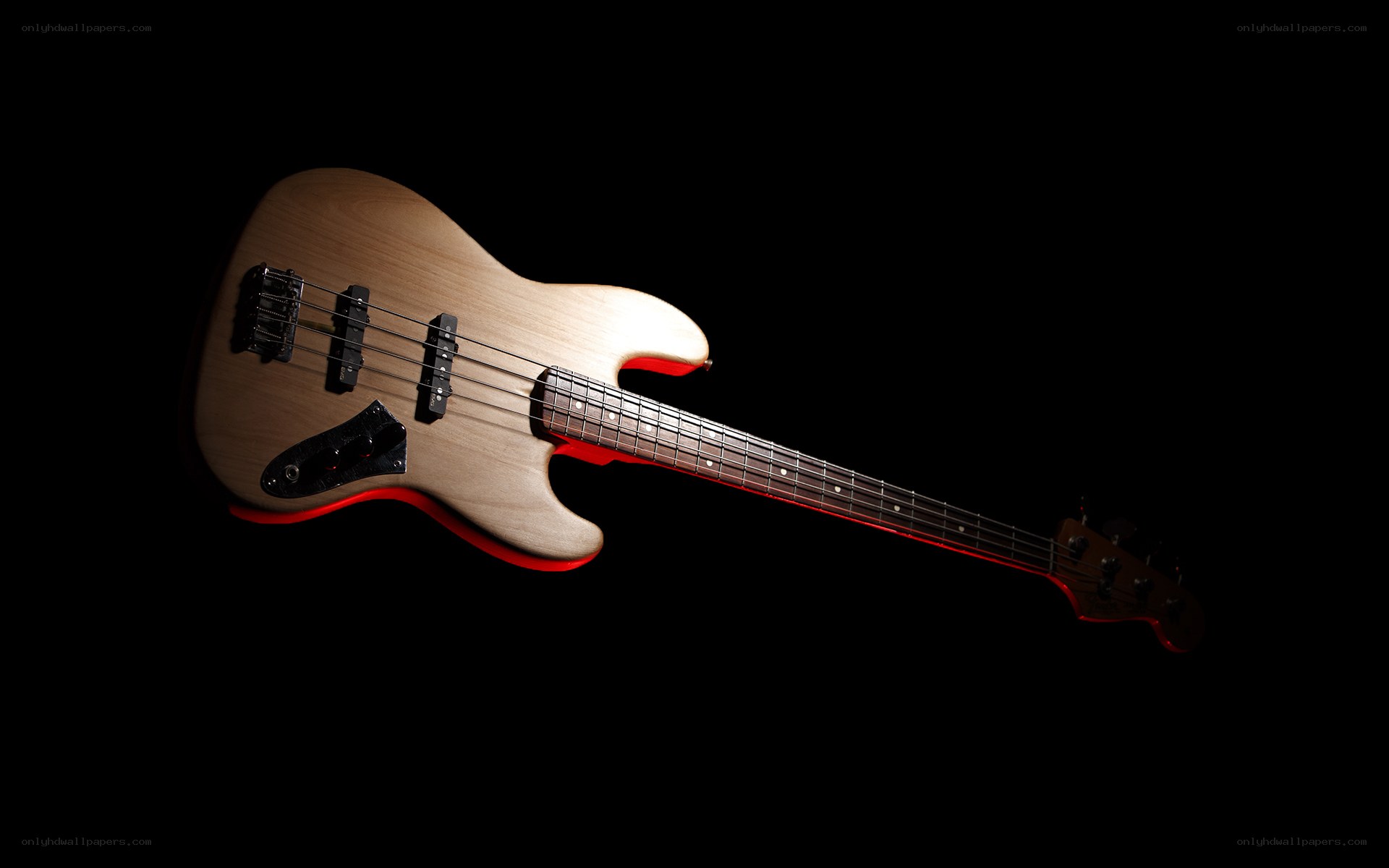 bass guitar on black background