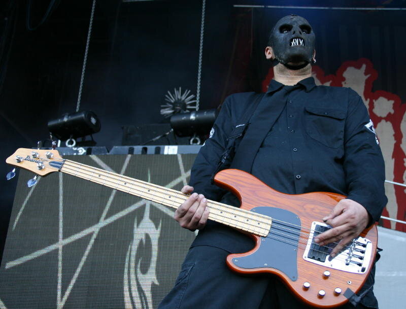Bassist in skull mask on stage
