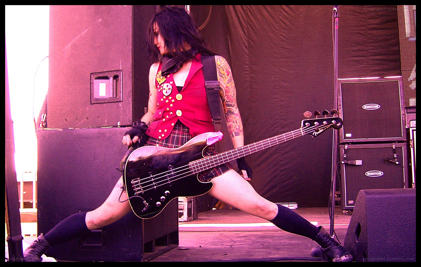Bassist on stage performing