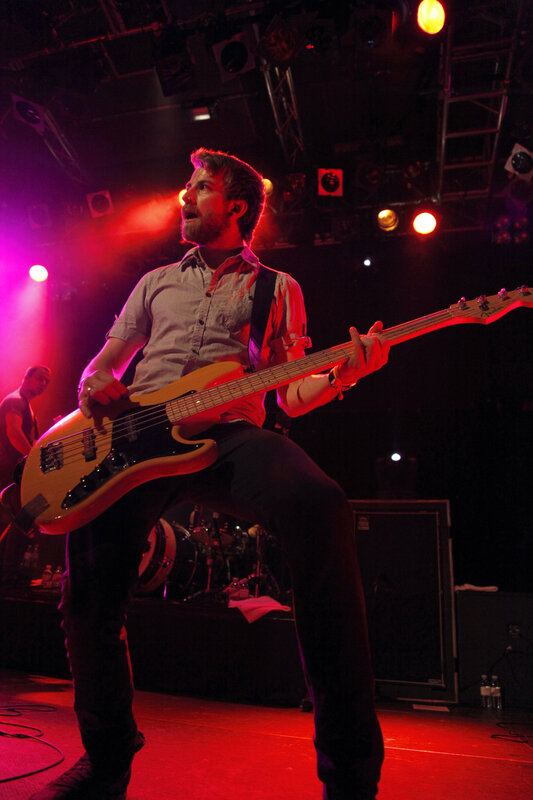 Bassist performing on stage