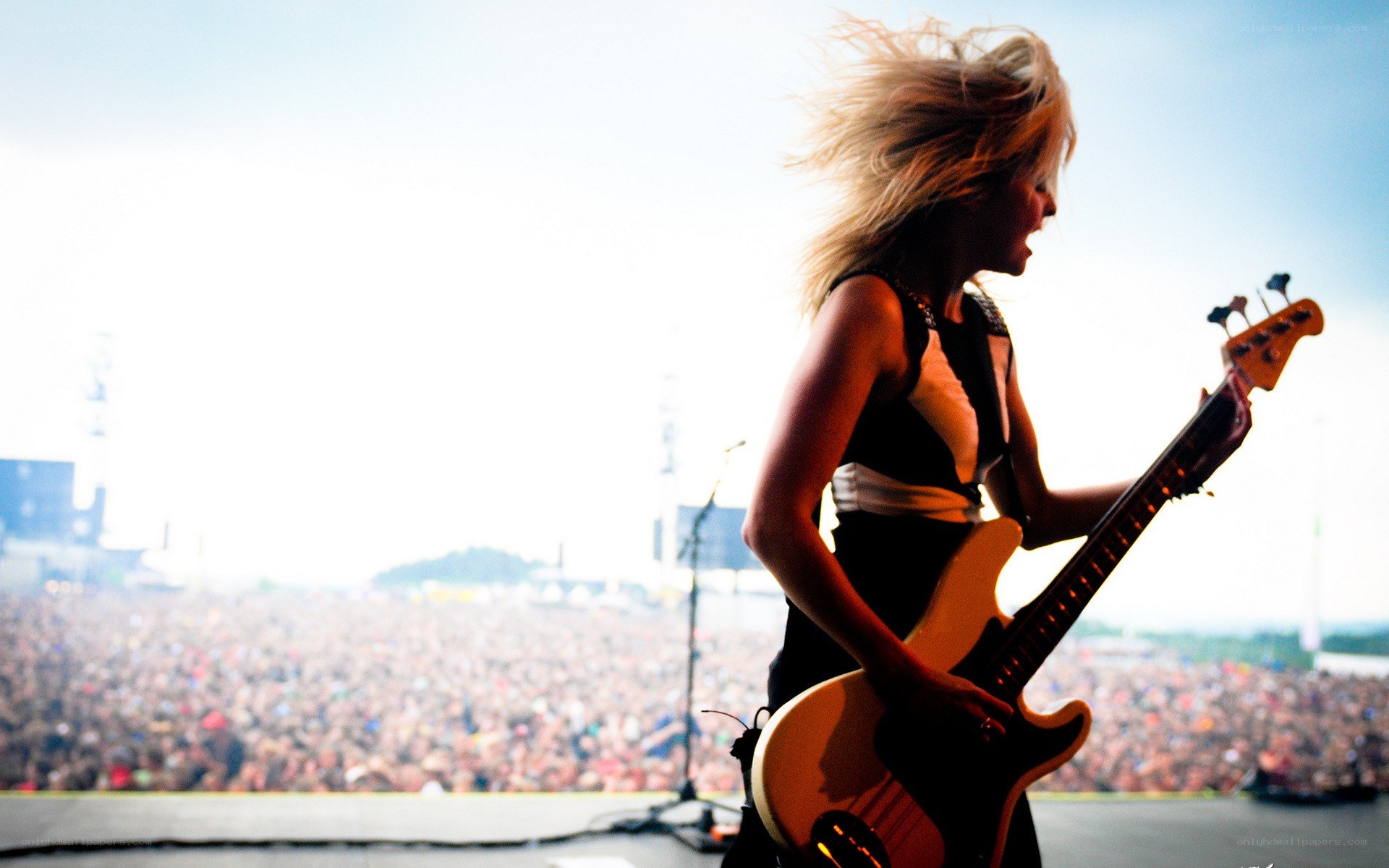 Bassist performing on stage