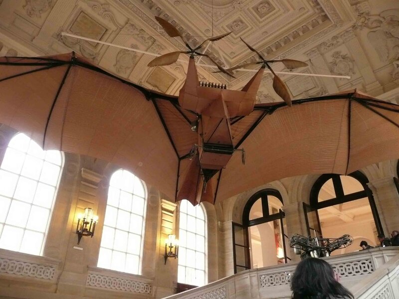 Bat-like aircraft in grand hall