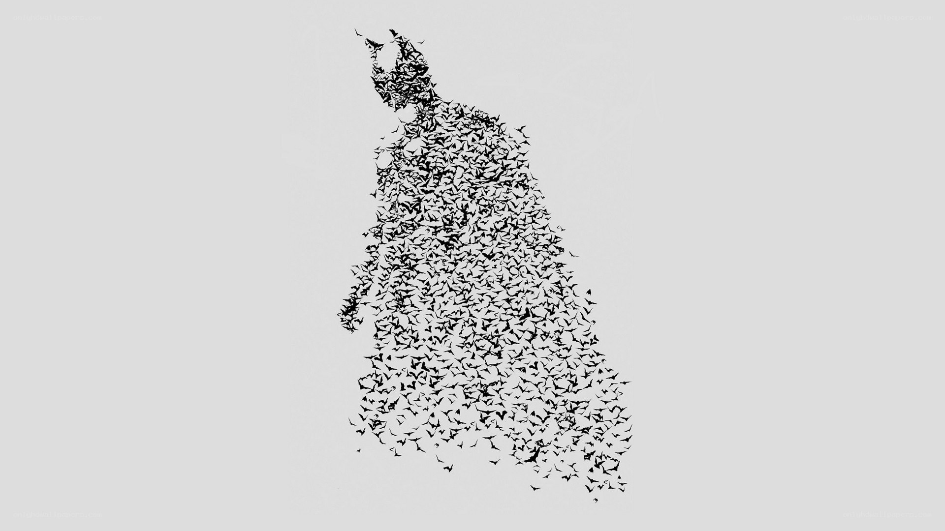 bat swarm forming batman silhouette