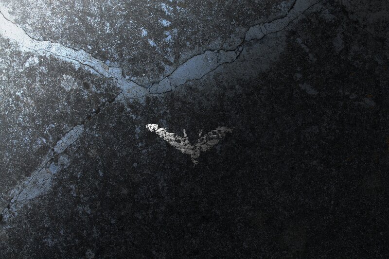 Bat Symbol on Concrete