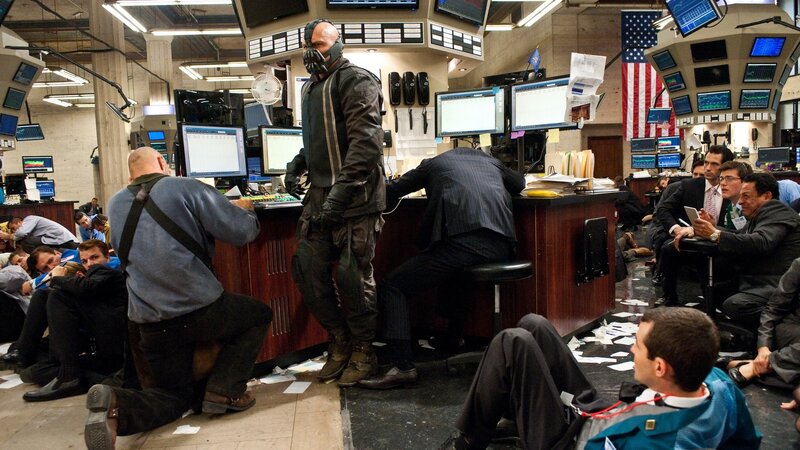 Batarang-wearing Man in Stock Exchange