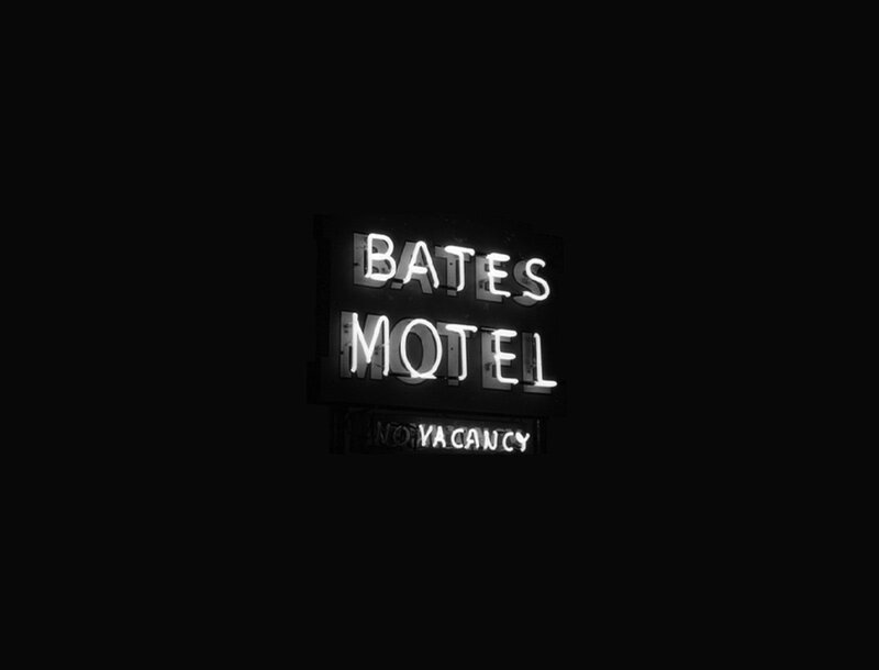 Bates Motel neon sign at night