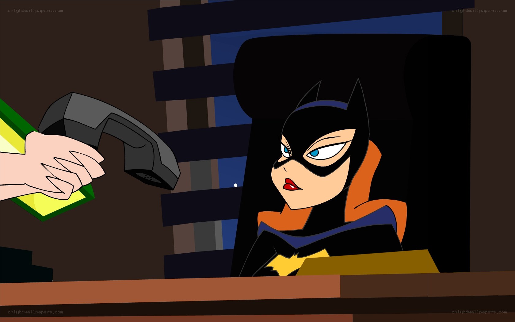 Batgirl at a desk