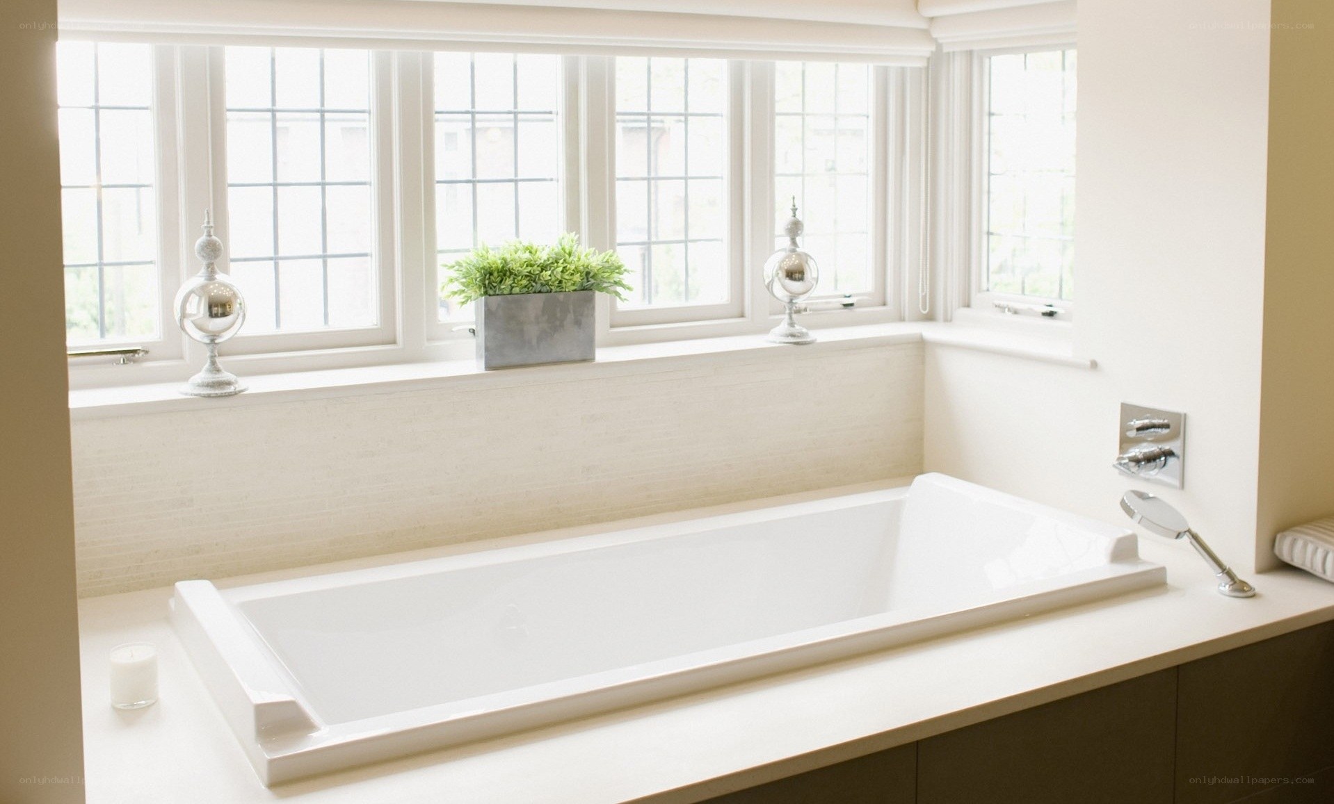 Bathroom with bathtub and window