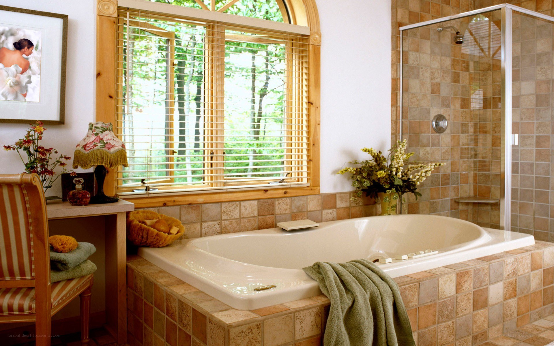Bathroom with tub and forest view