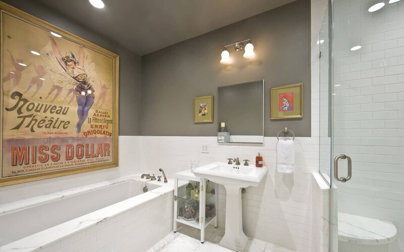 Bathroom with vintage poster