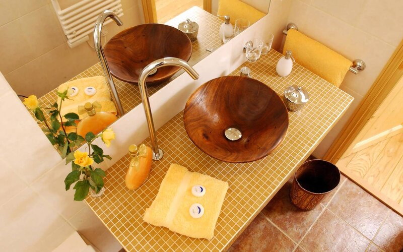 Bathroom with wooden sinks