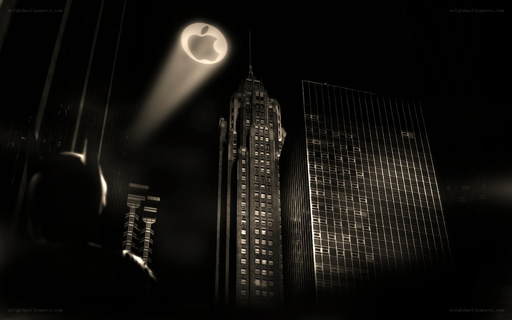 Batman and Apple logo at night