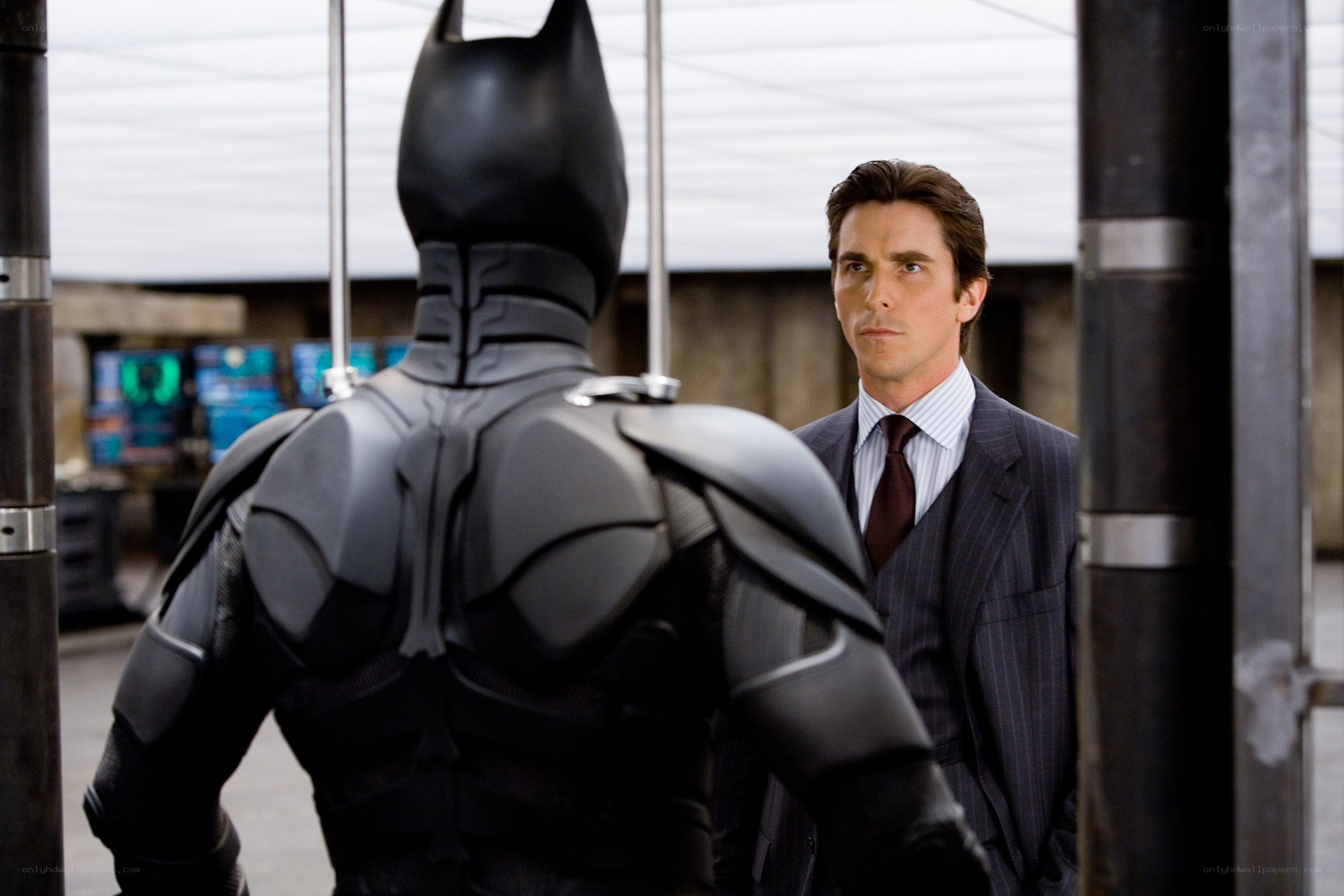 Batman and Bruce Wayne in a scene