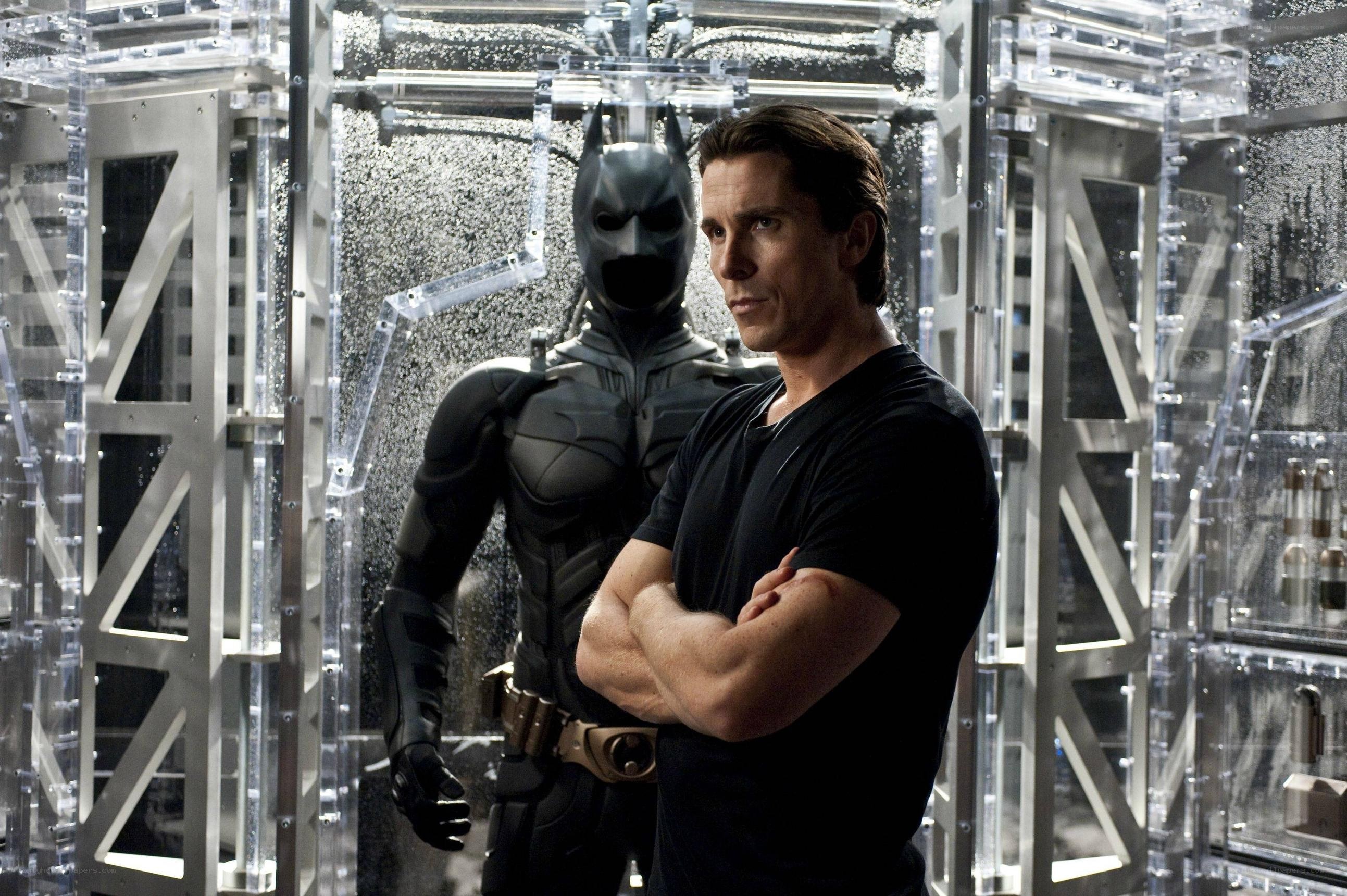 Batman and Bruce Wayne in Batcave