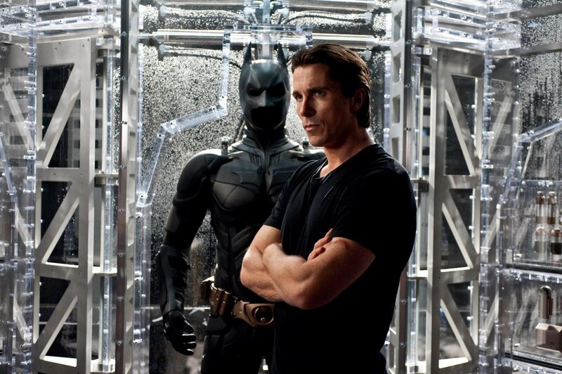 Batman and Bruce Wayne in Batcave