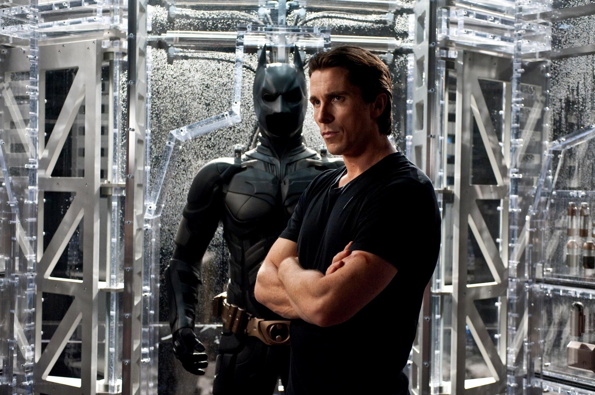 Batman and Bruce Wayne in Batcave